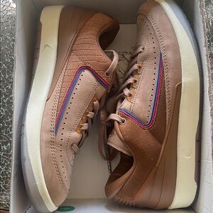 Jordan Brown Sneakers with Blue and Red Accents